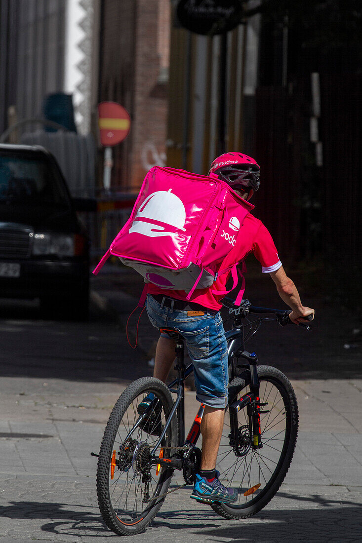 Europe,Scandinavia,Sweden. delivery by bike