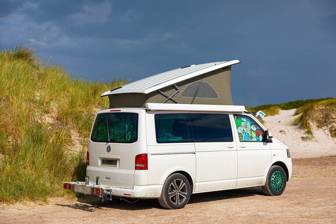 Converted van near a beach. Volkswagen Transporter