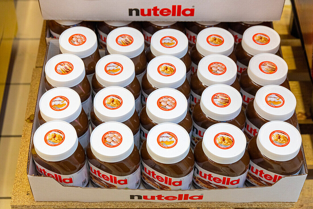 Products in a supermarket shelf. Spread. Nutella