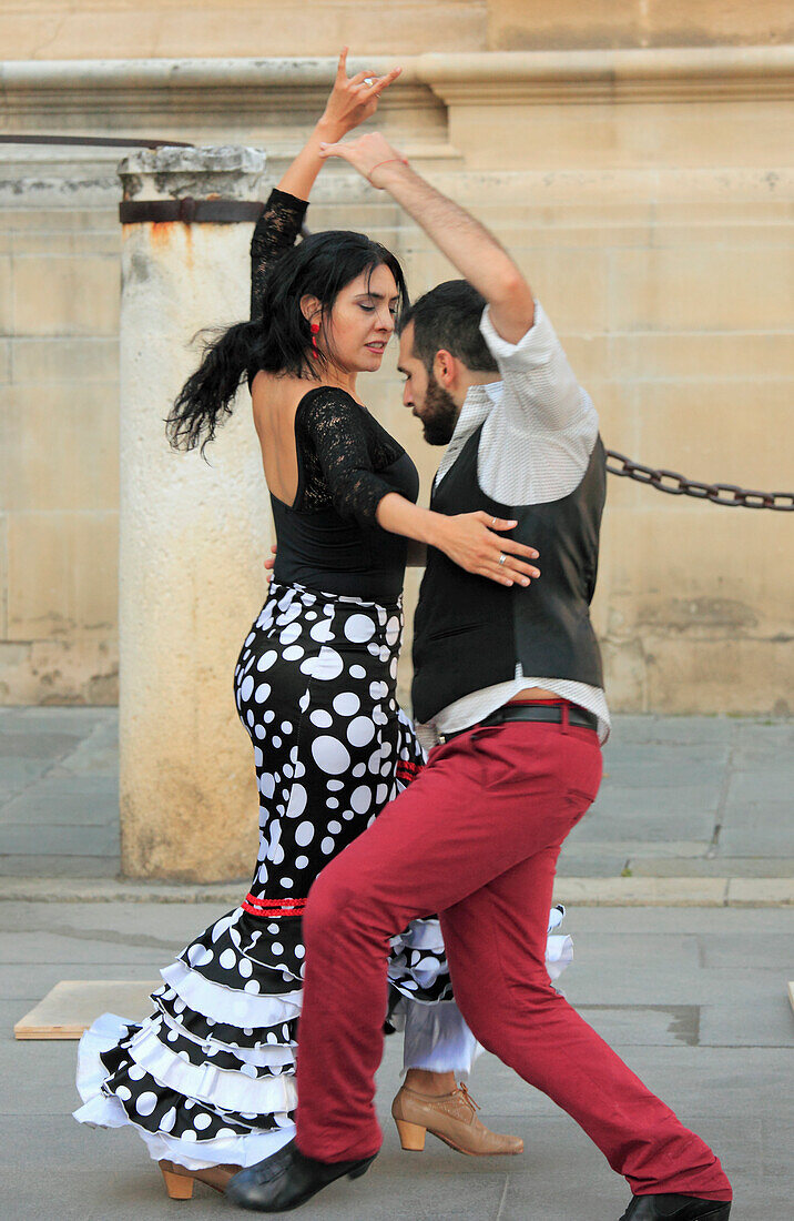 Spain,Andalusia,Seville,flamenco dancers,street scene