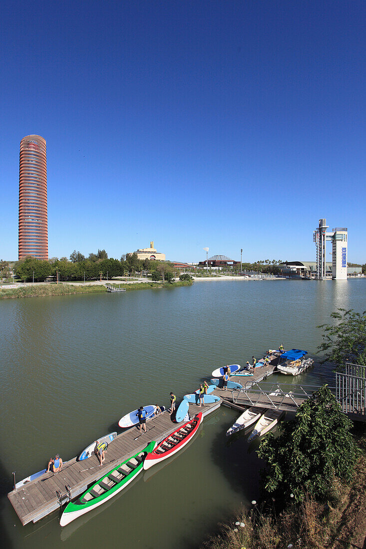 Spain,Andalusia,Seville,Guadalquivir River,paddle boarders,people