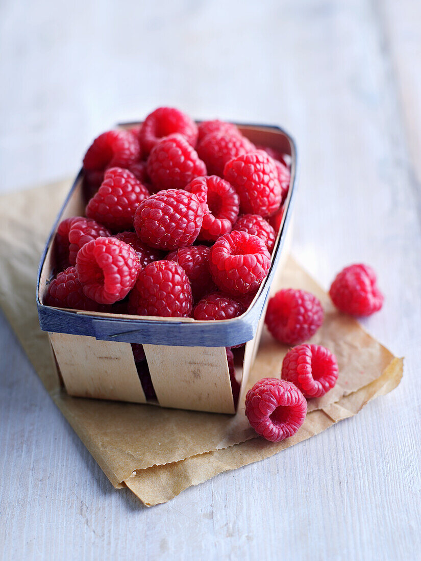 Fresh raspberries in chip baskets