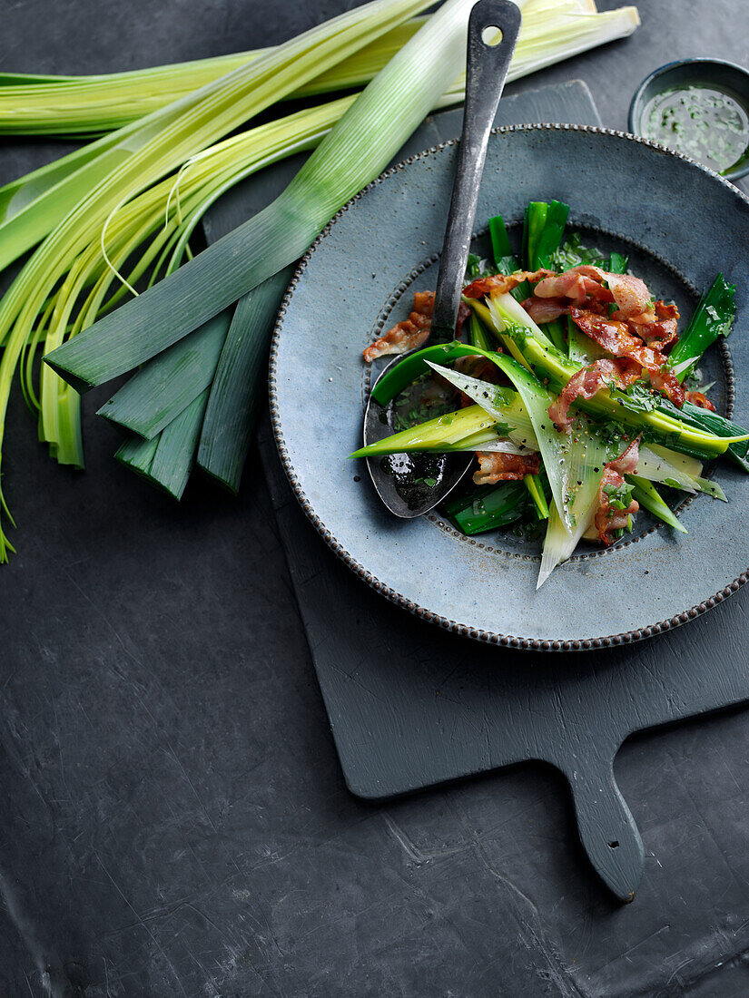 Fried leek with bacon strips