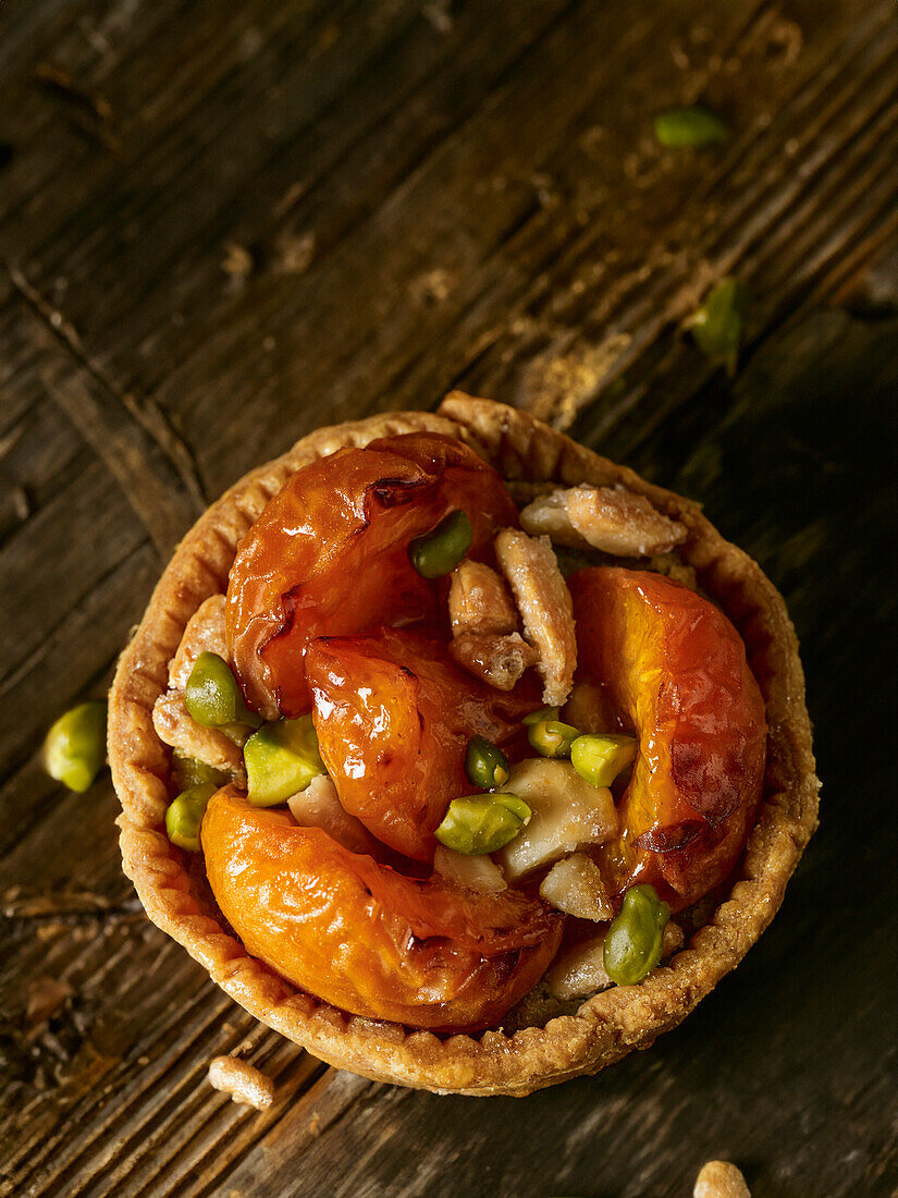 Apricot tart with pistachios and almonds