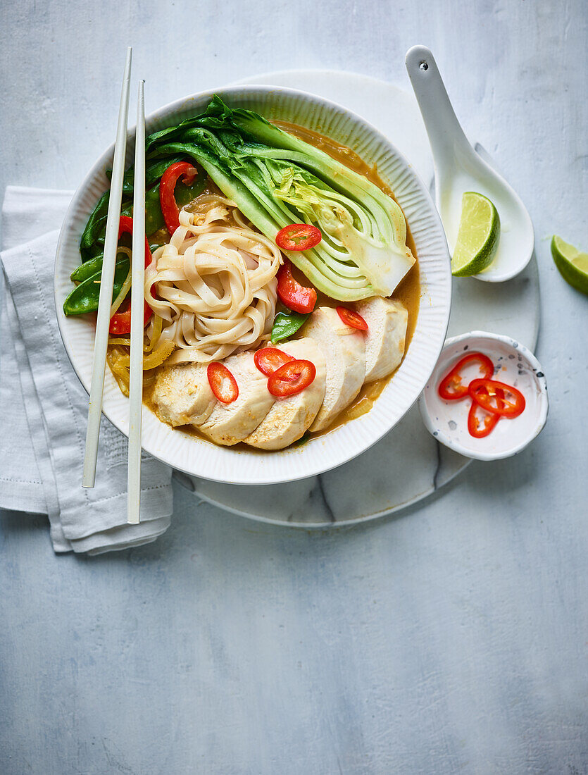 Laksa with chicken, pak choi and rice noodles