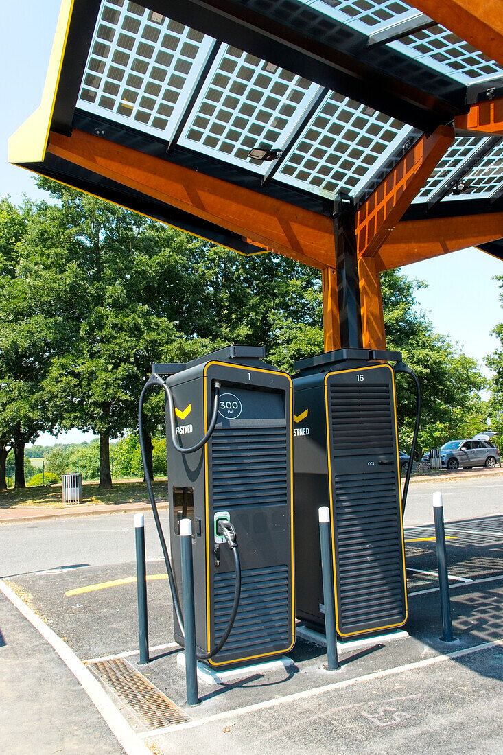 Solar panels on motorway electric car charging station