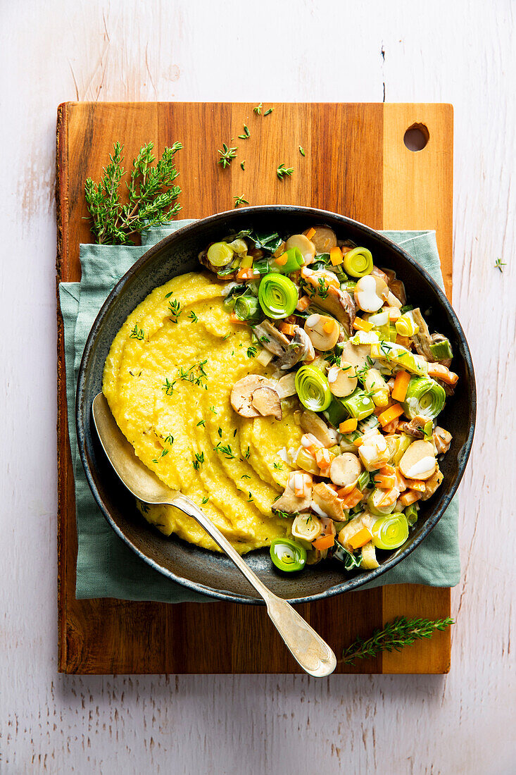 Polenta bowl with king oyster mushrooms and leek