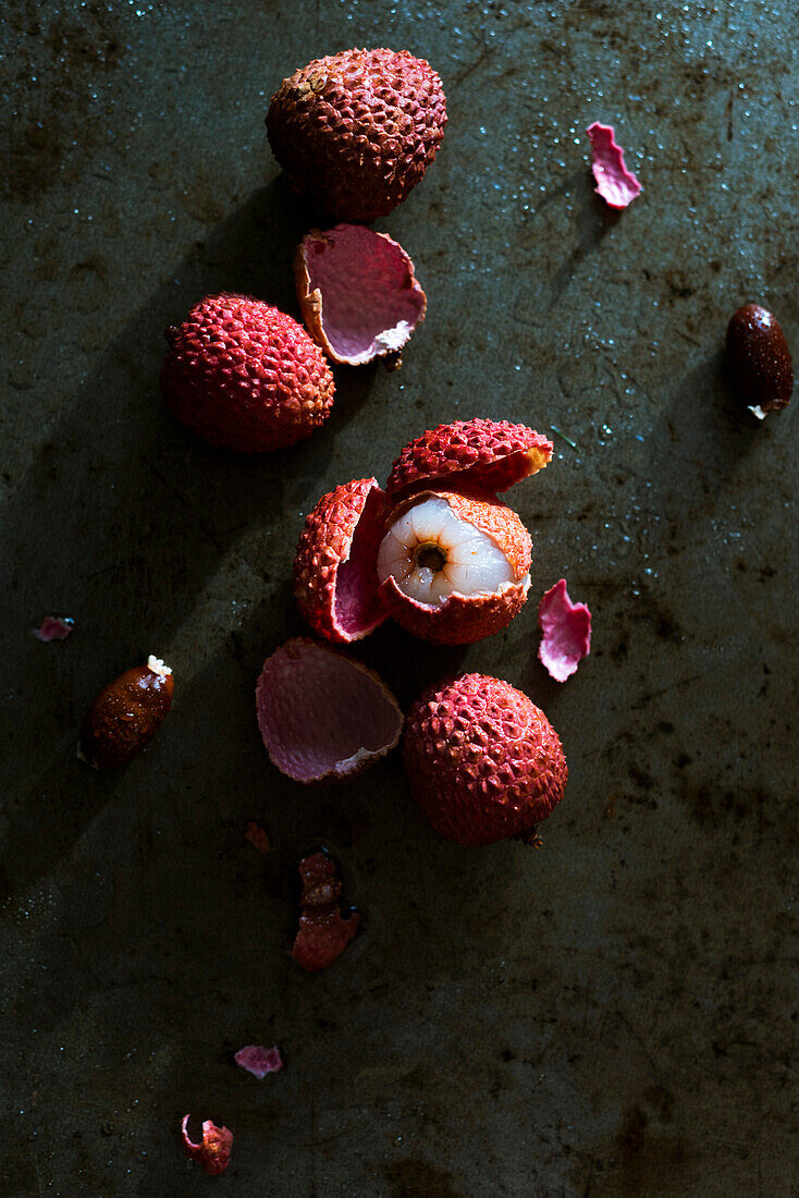 Lychees on a grey background