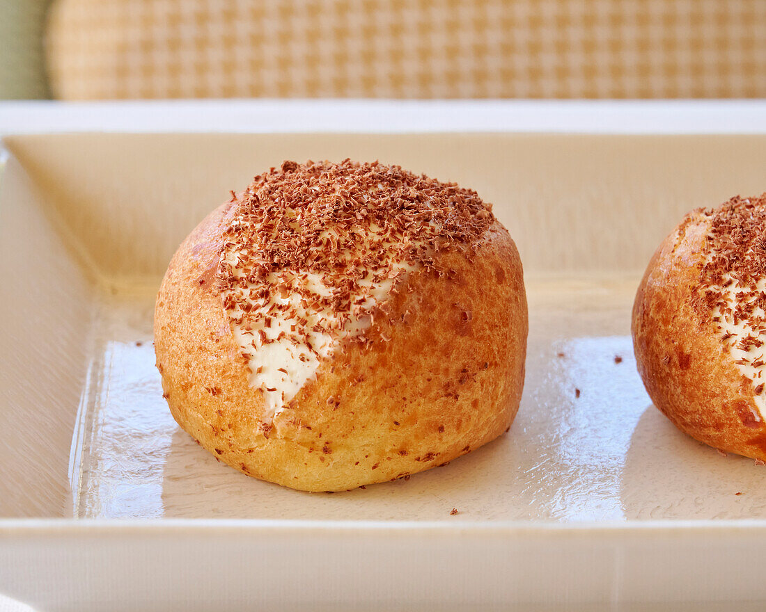 Maritozzi, sweet Italian rolls with cream filling