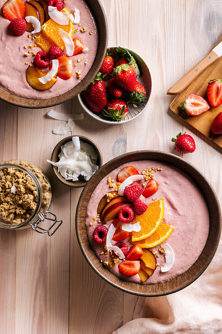 Smoothie bowl with fruit and coconut chips