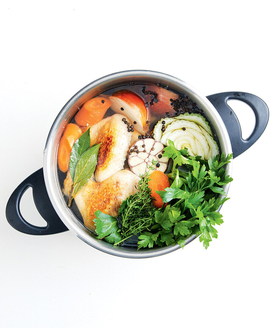 Ingredients for bone broth with vegetables in a pressure cooker