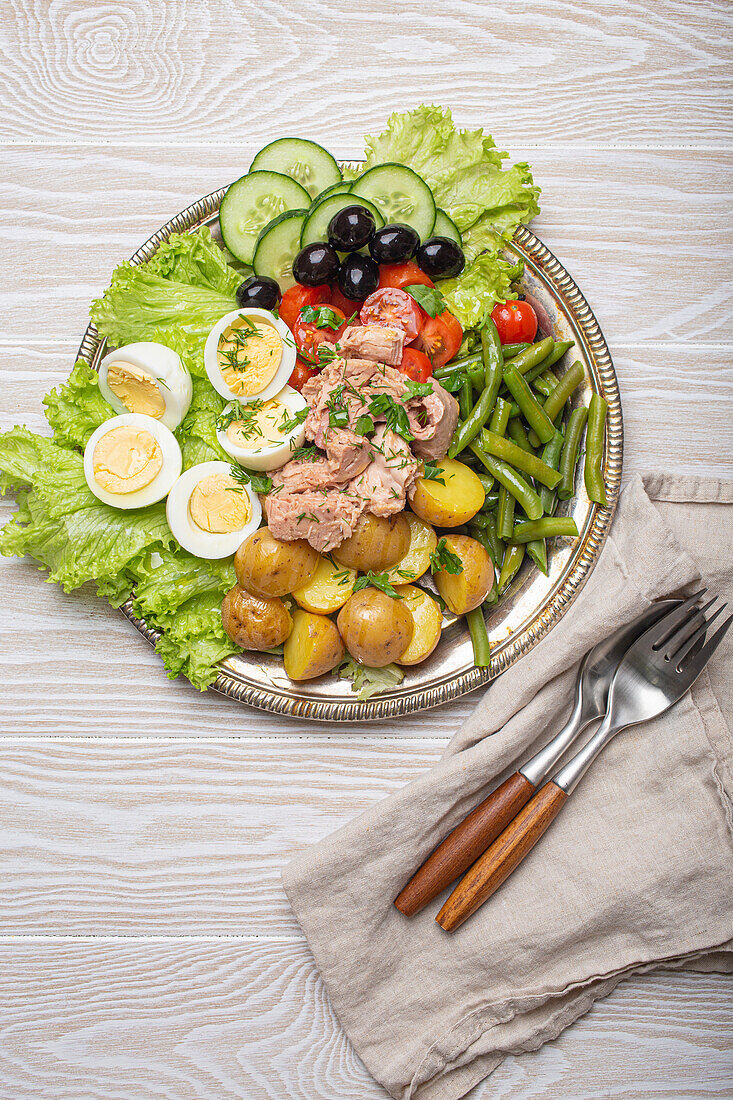 Nice salad with tuna, eggs, potatoes and olives