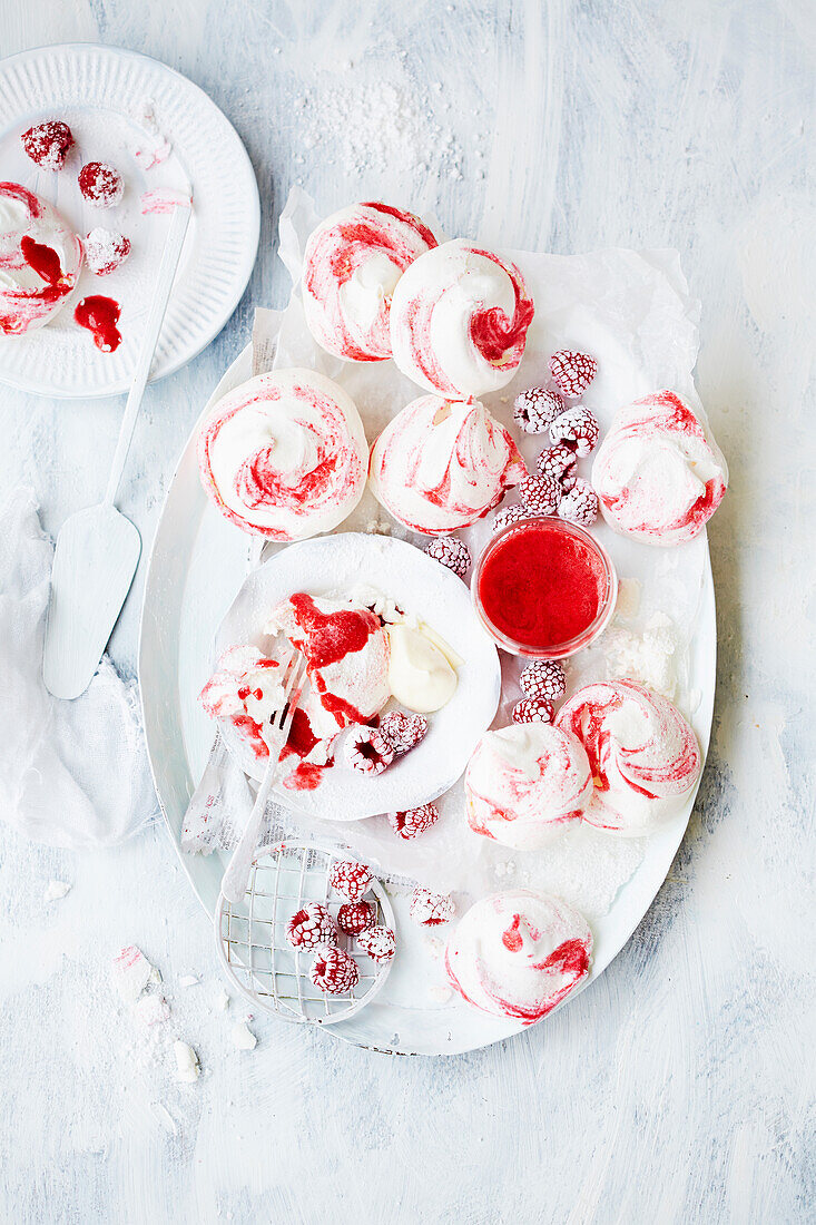 Raspberry and rosewater meringues