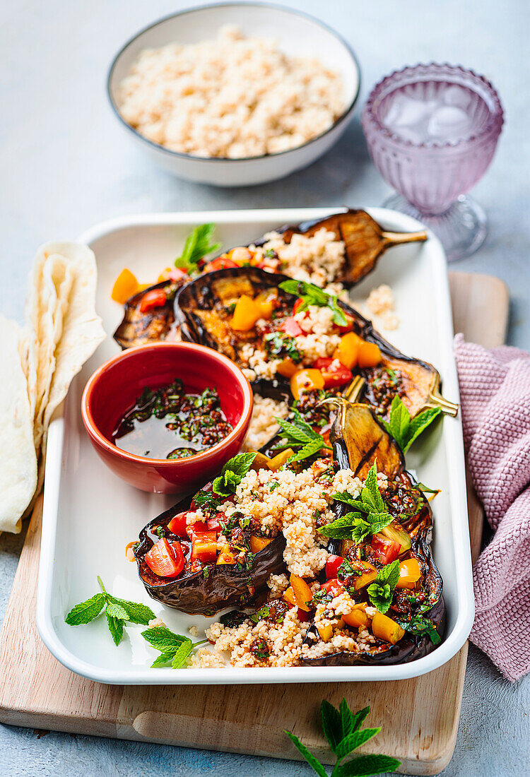 Baked aubergine with gremolata and couscous