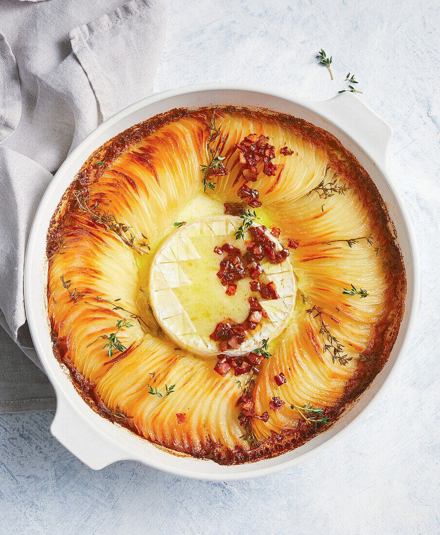 Potato fondue with camembert and bacon