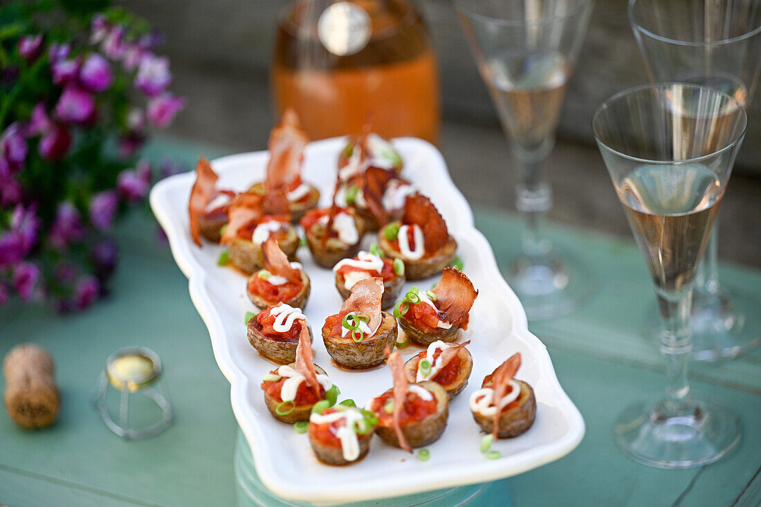 Mini patatas bravas with cured ham