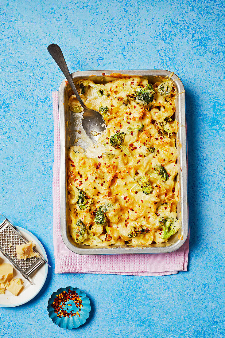 Broccoli pasta bake topped with cheese