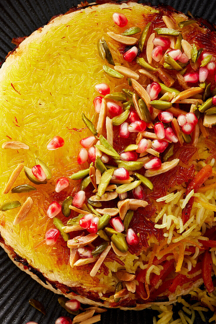 Jeweled rice - Persian rice cake with saffron and pomegranate seeds