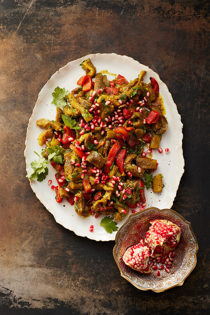 Persian eggplant and bell pepper vegetables with pomegranate seeds