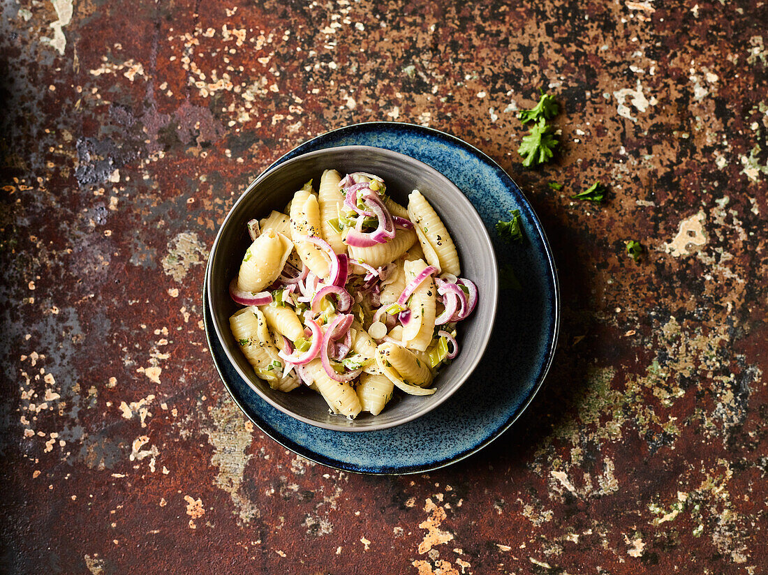 Pasta salad with red onions