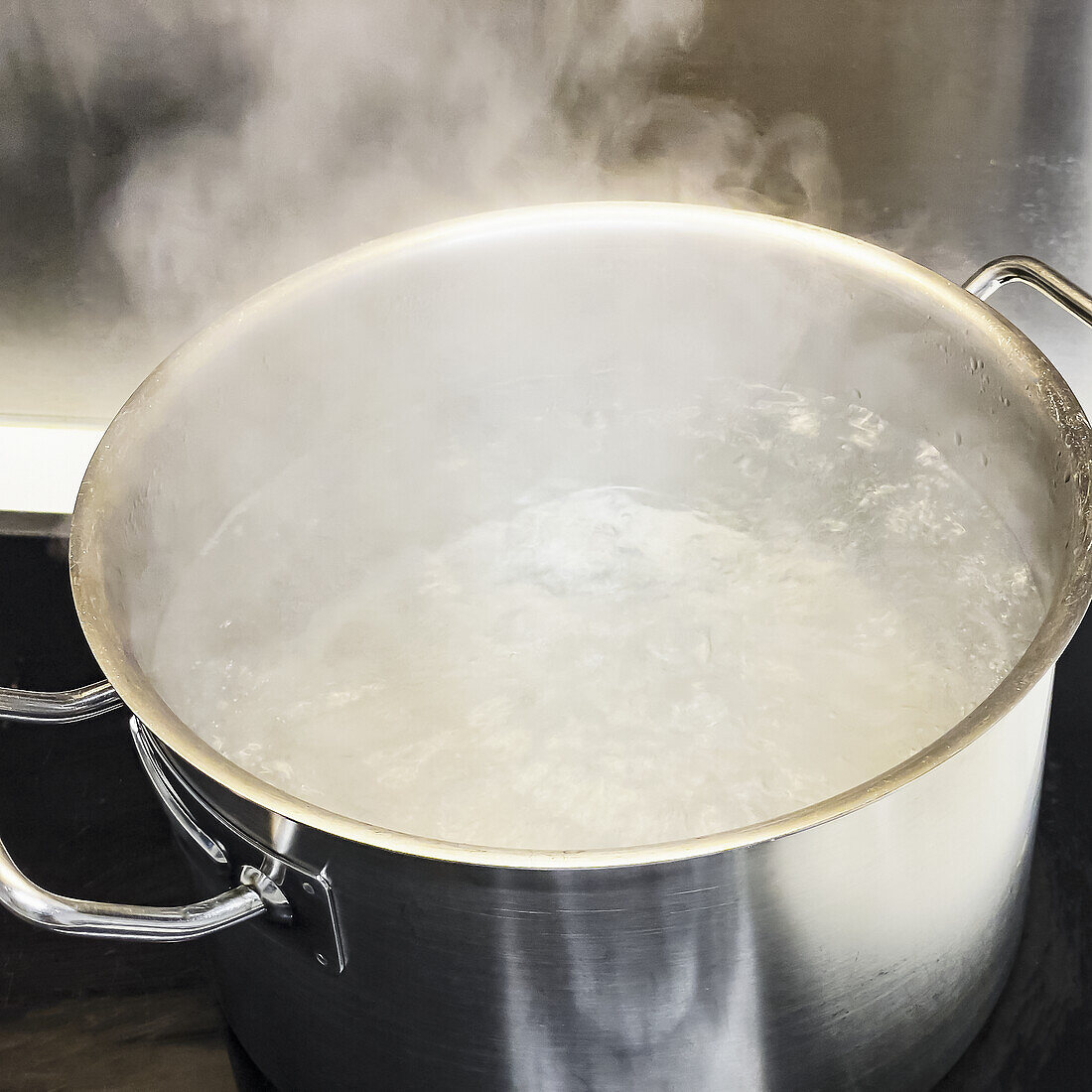 Saucepan with boiling water