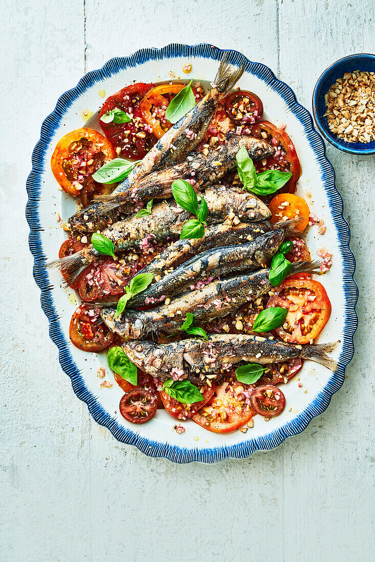 Sardines with tomato and almond salsa