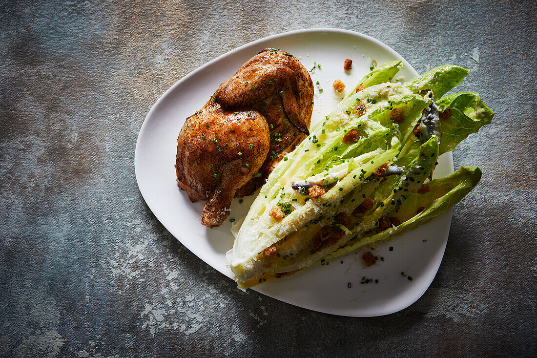 Chicken drumsticks with romaine lettuce