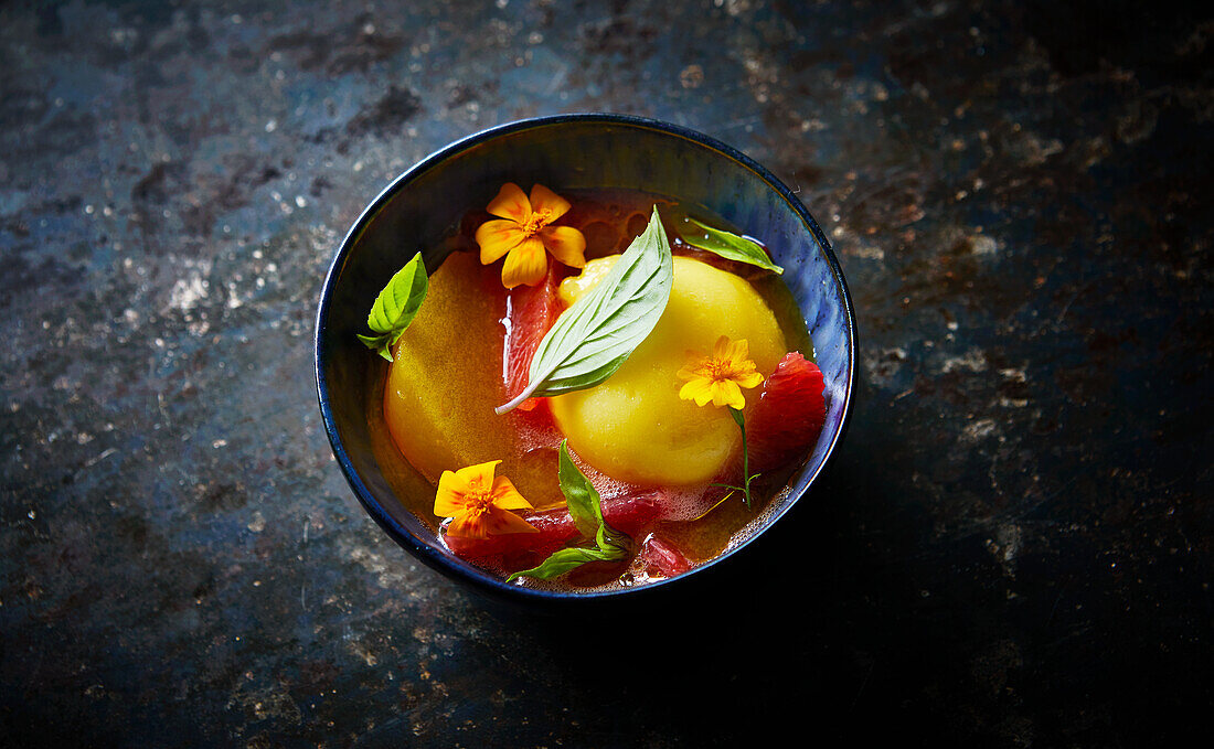 Clementine sorbet with herbs and flowers