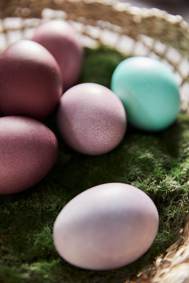 Colourful Easter eggs in a basket