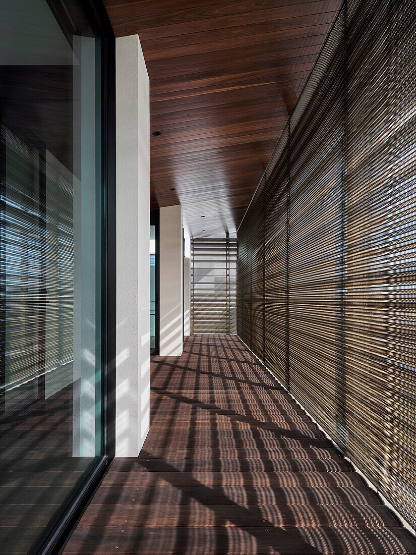 Upper terrace with wooden slats and modern sun protection in Dover Heights, Australia