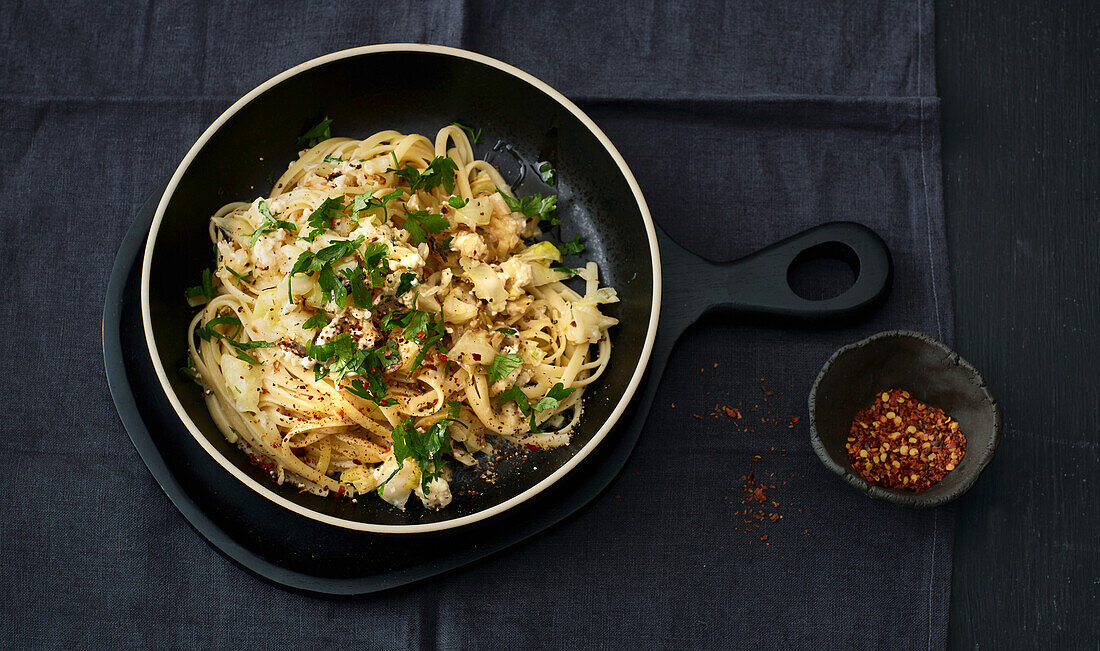 Cabbage noodles with feta and chili