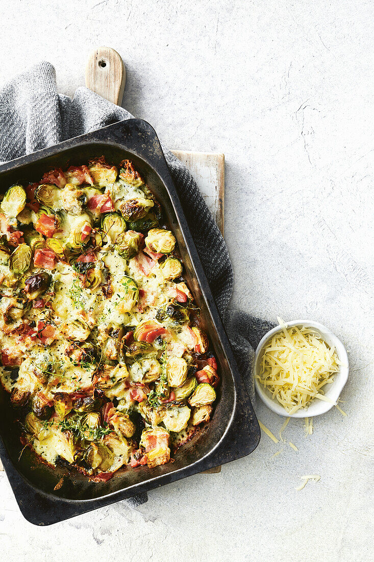 Baked Brussels sprouts with bacon and cheese