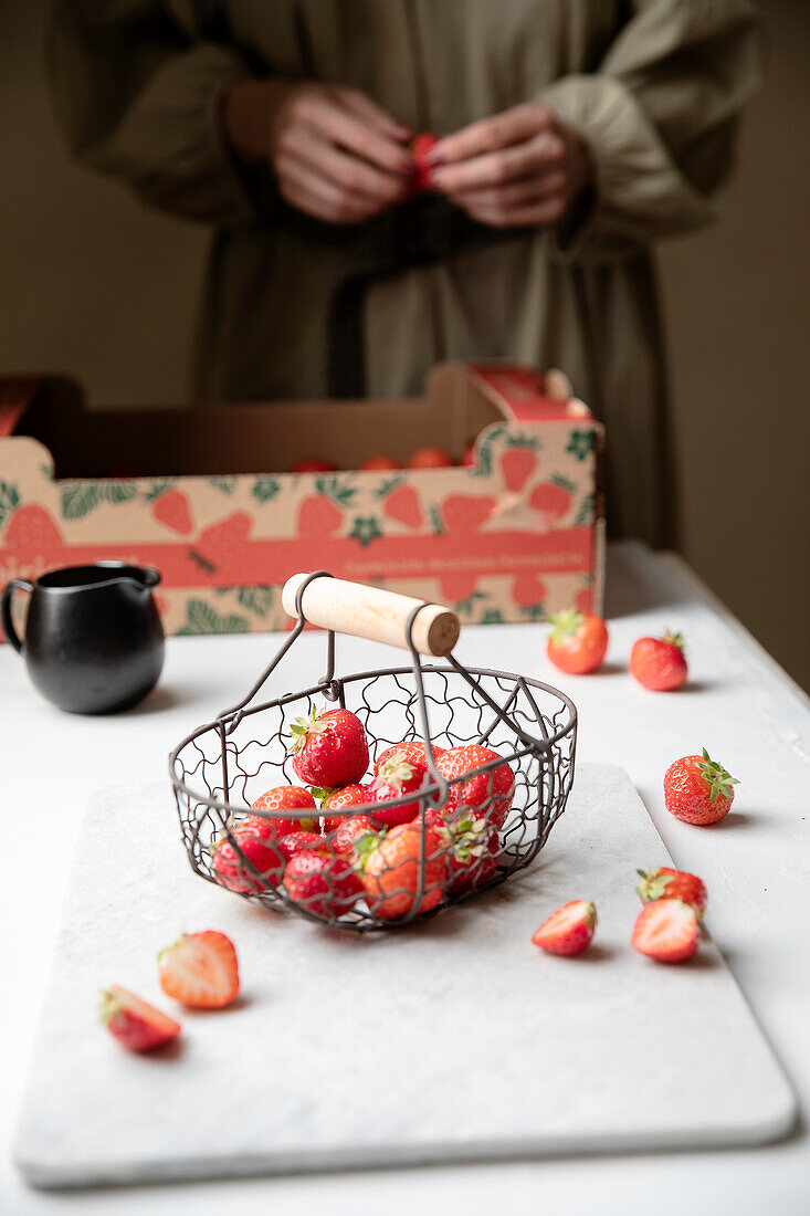 Fresh strawberries in a wire basket