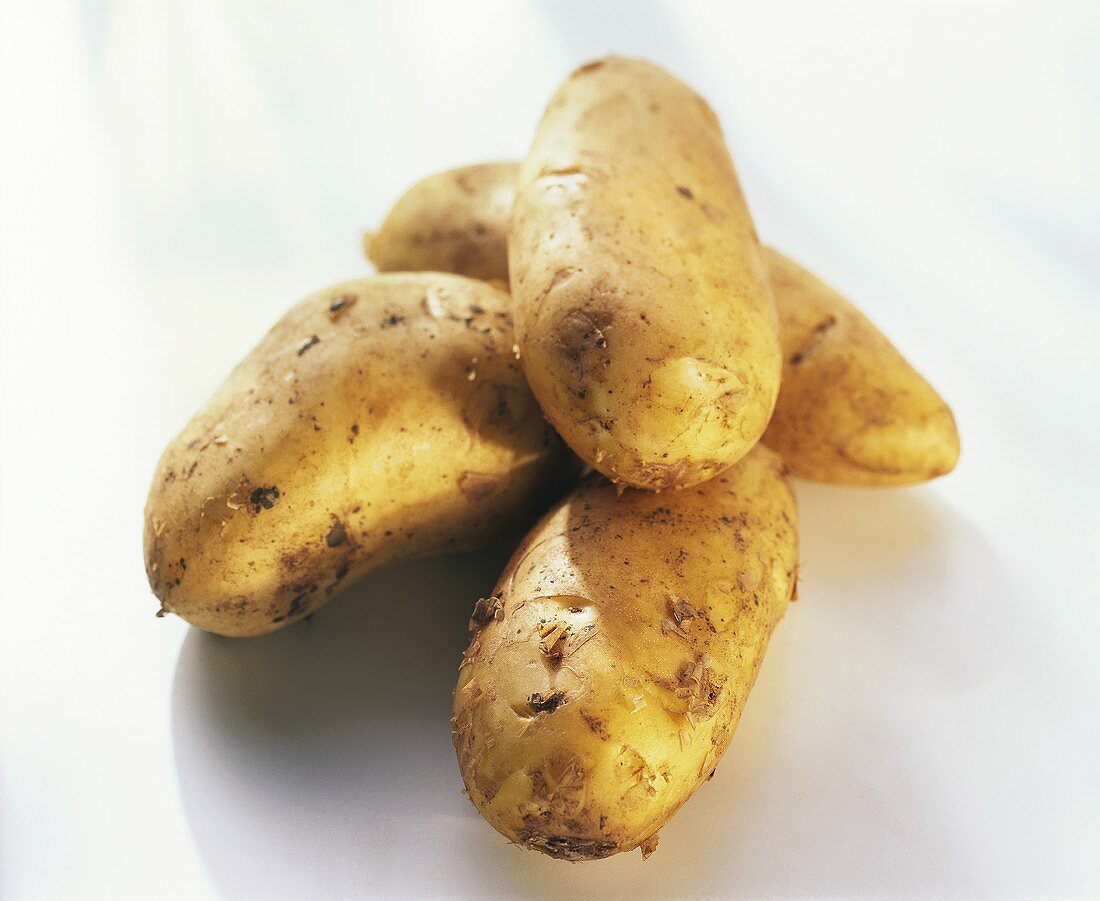 Four Italian Spunta potatoes
