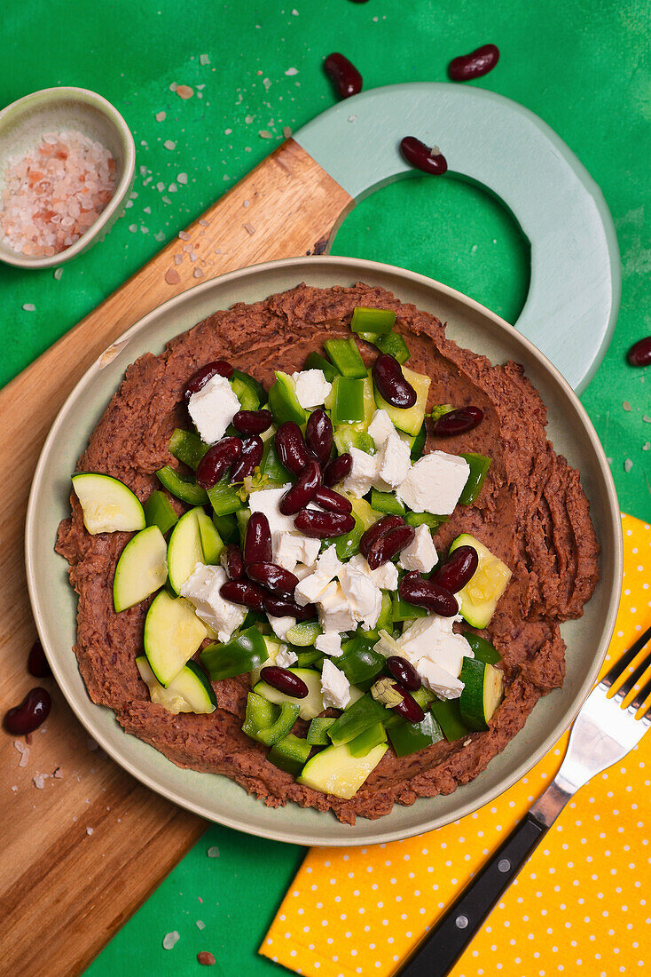 Kidney bean paste with courgettes, peppers and feta