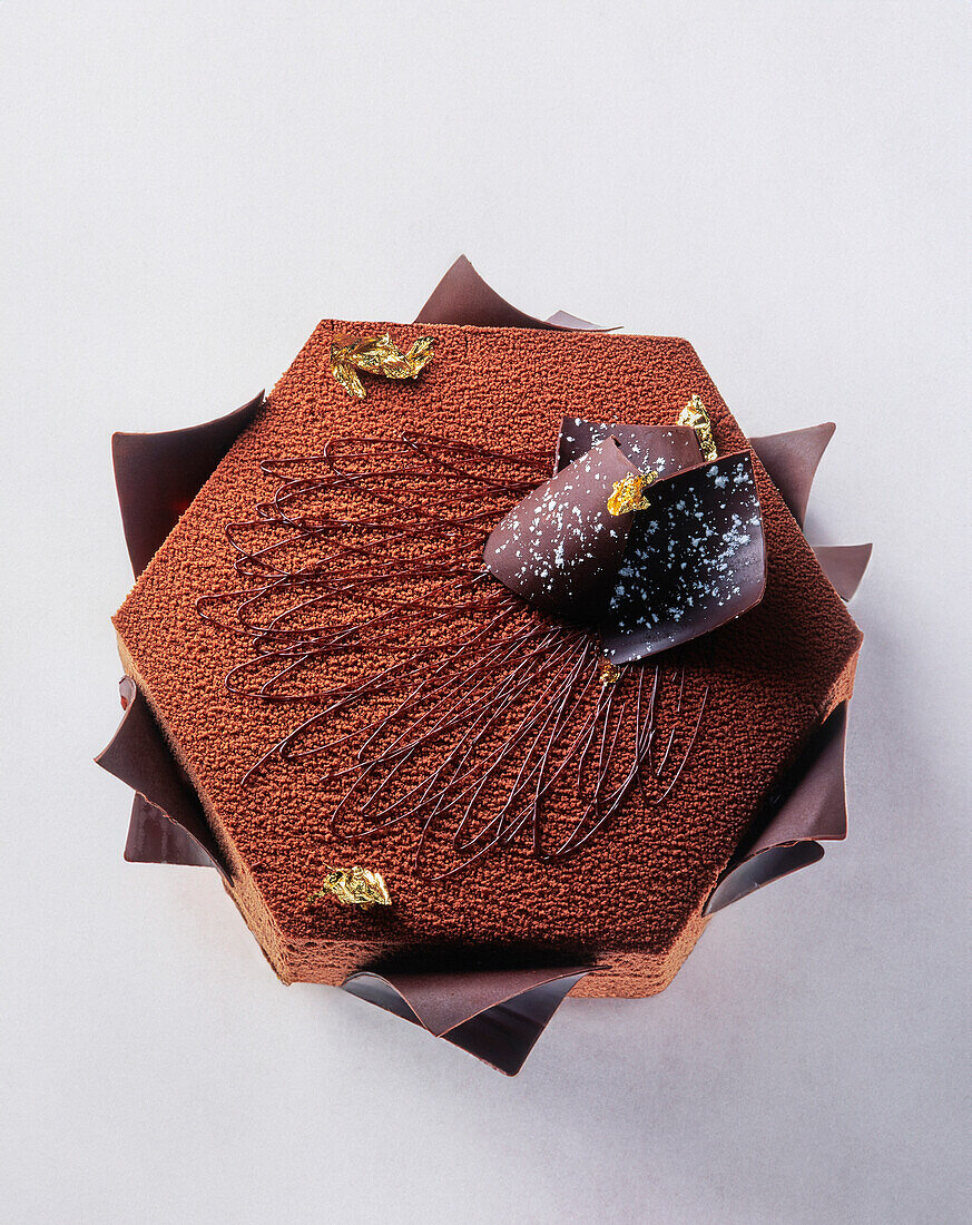 Chocolate cake with gold leaf