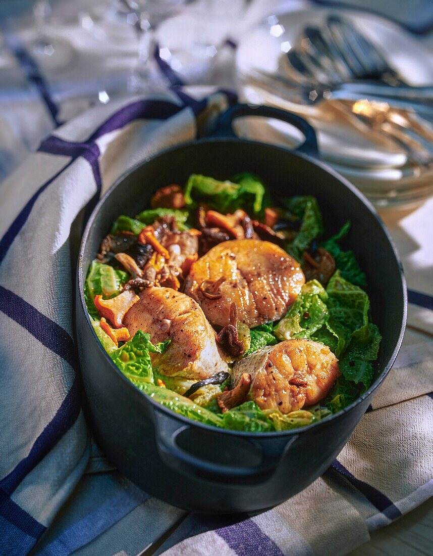 Stew with pollock, savoy cabbage and mushrooms