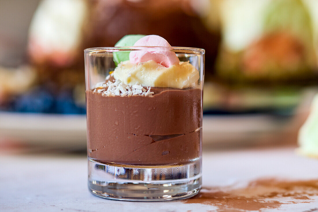 Chocolate mousse with colorful cream