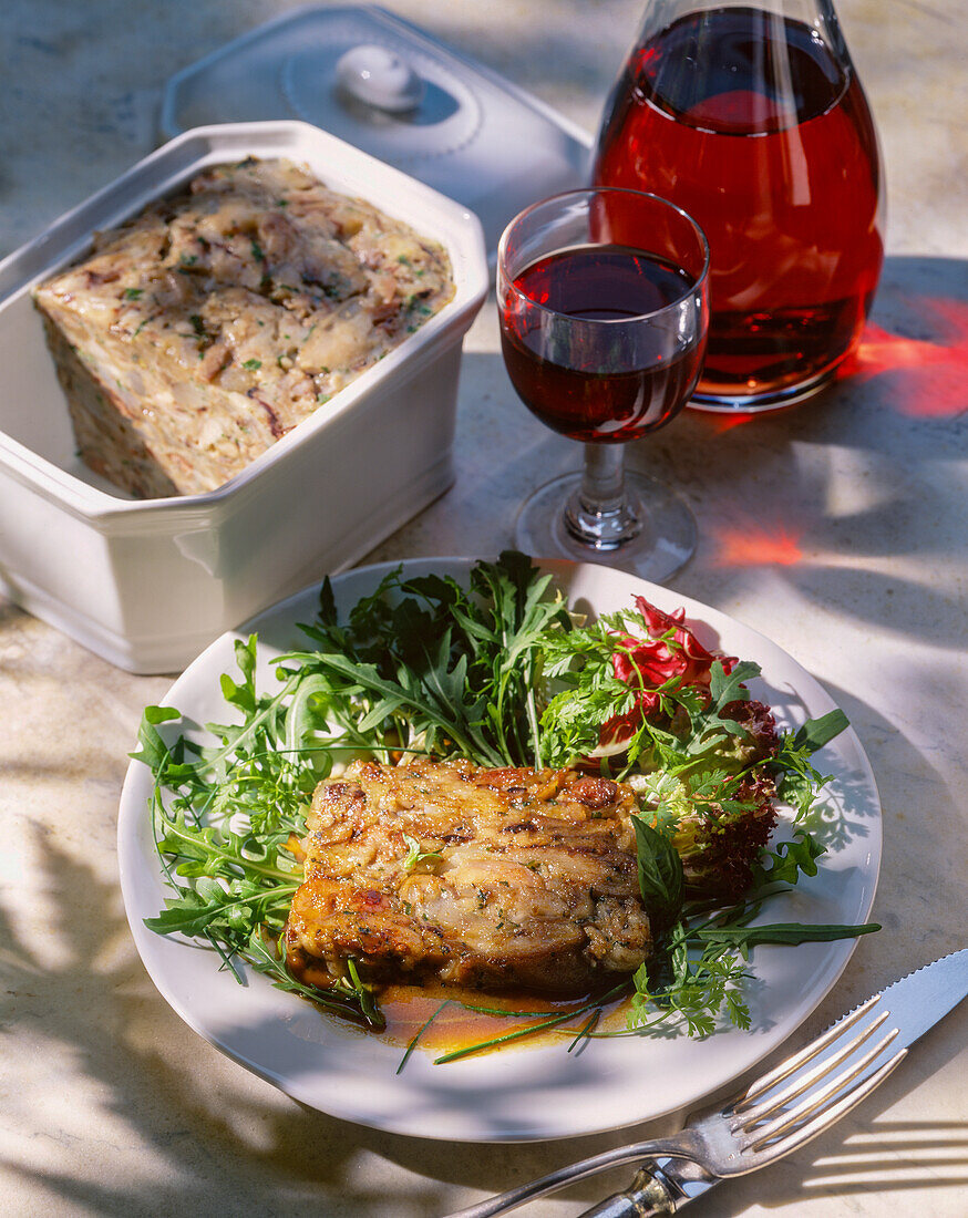 Terrine of pork trotter with herbs and mesclun salad