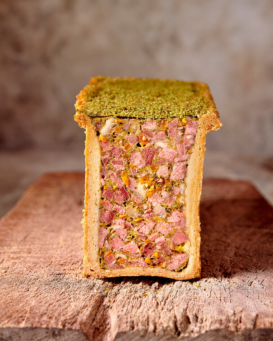 Pork pâté with pistachios and herb crust