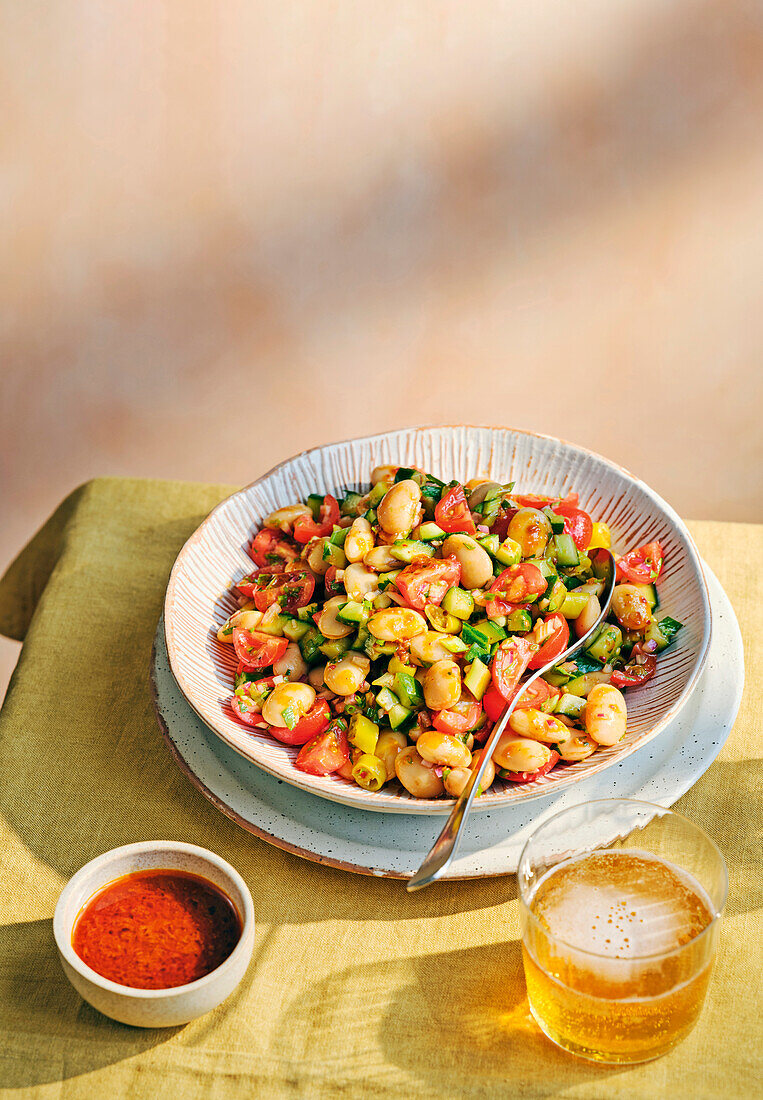 Summer salad with broad beans, cucumber and cherry tomatoes