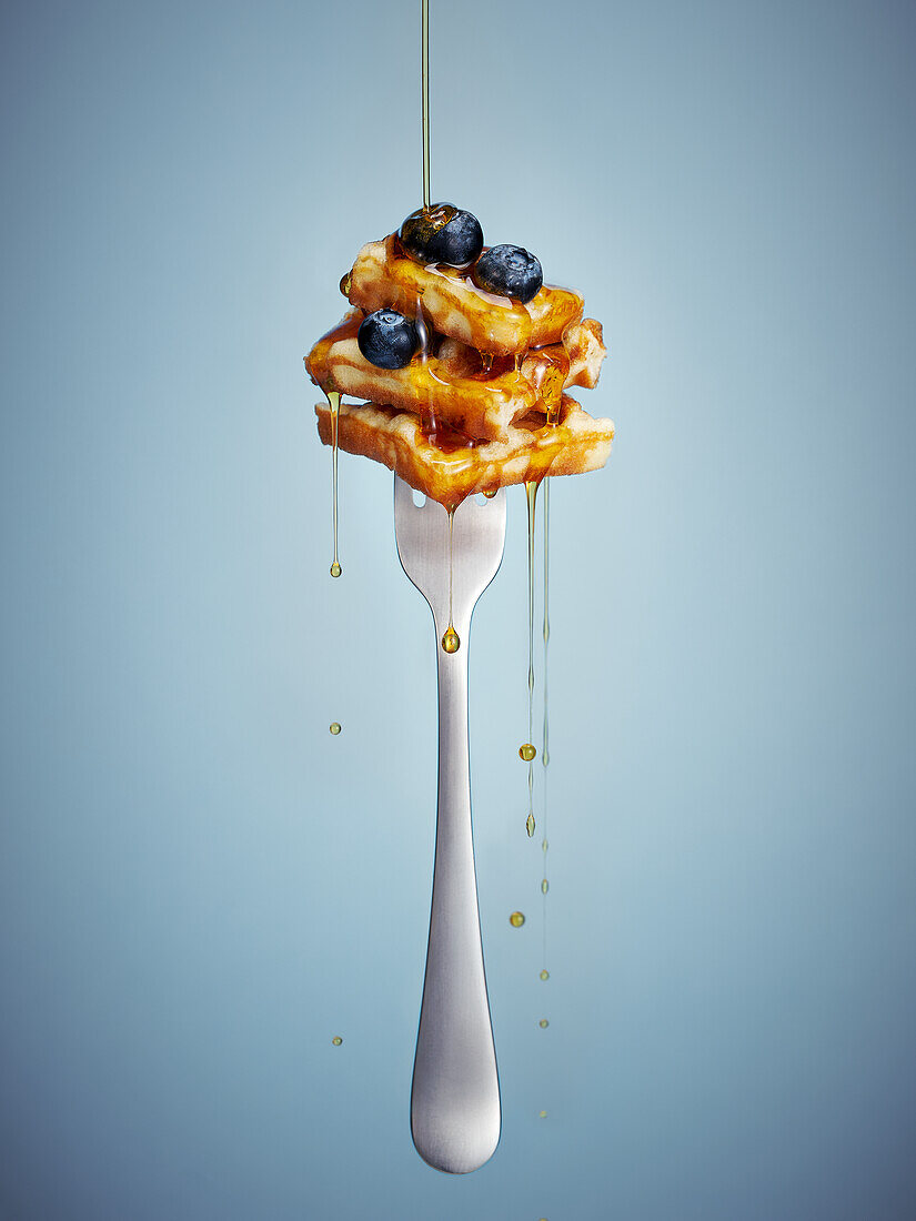 Waffles with blueberries and honey