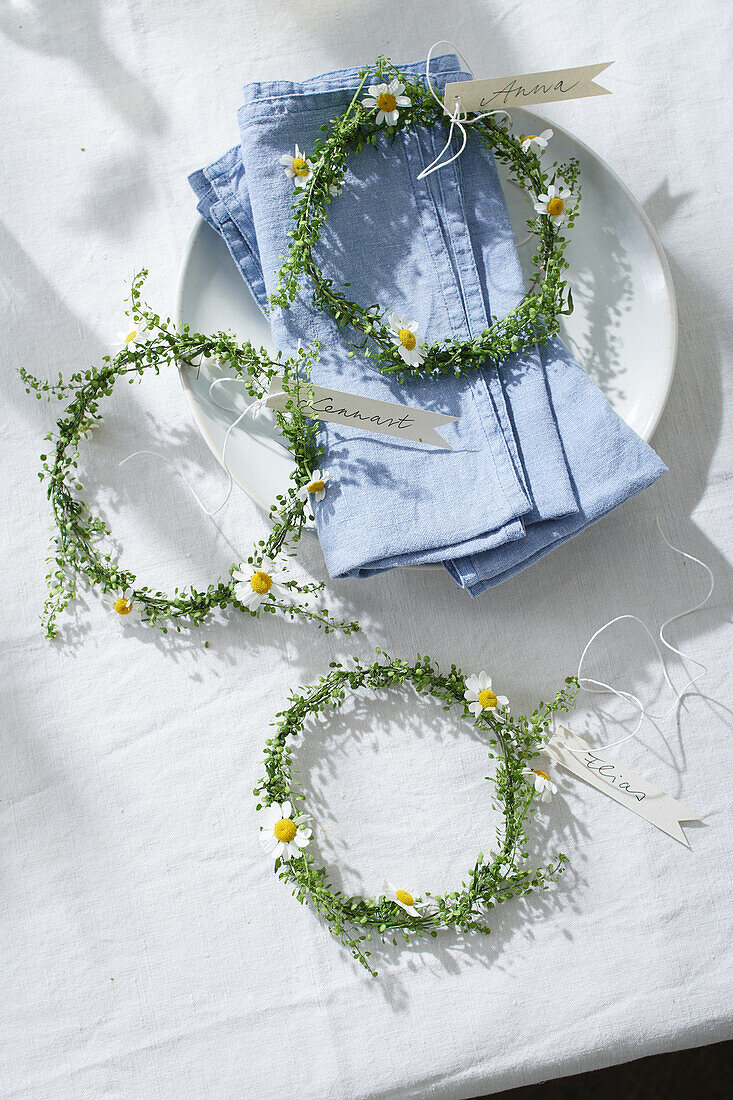 Flower wreaths made from grasses and camomile flowers