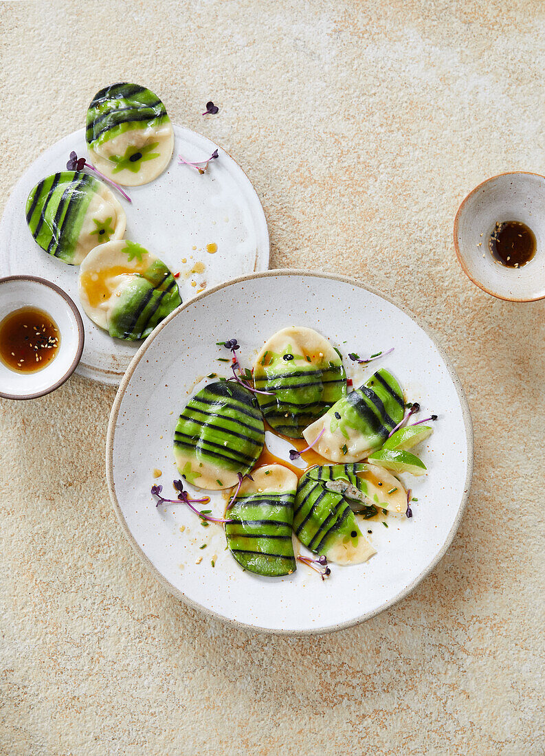 Striped ravioli with scampi filling