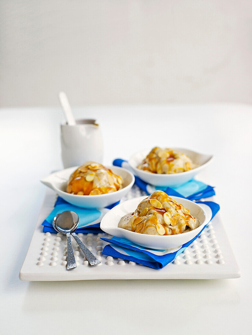 Banana ice cream with honey and flaked almonds