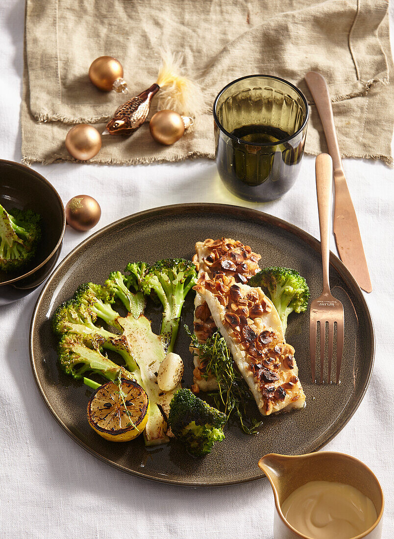 Baked trout with hazelnut crust and broccoli