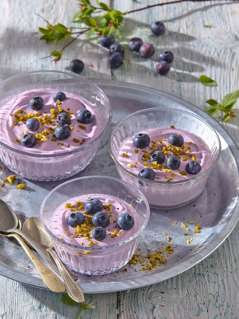 Blueberry mousse with pistachio crumble