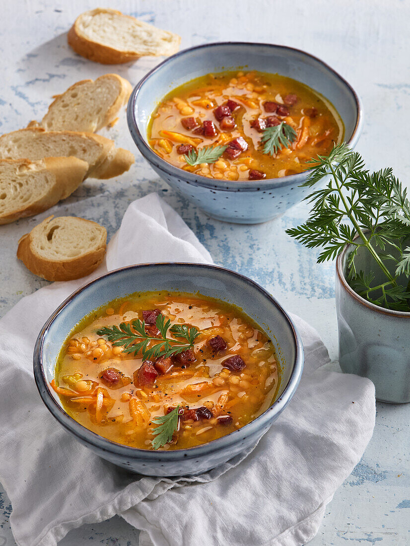 Carrot and lentil soup with smoked bacon