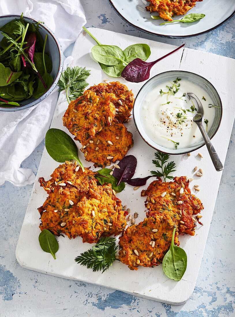 Chicken and carrot pancakes with herb yoghurt dip