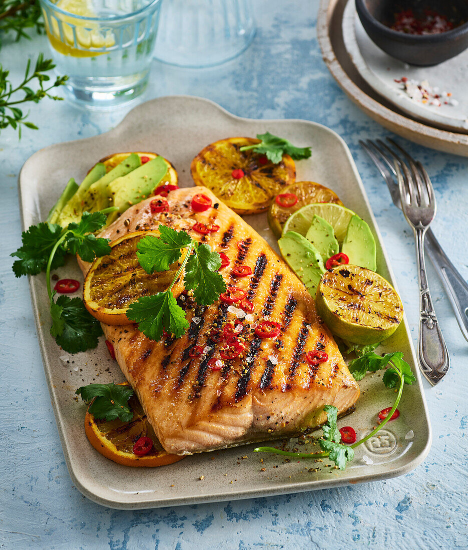 Grilled orange salmon with avocado and chilli